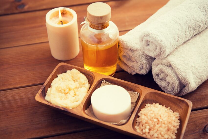 close up of natural cosmetics and bath towels